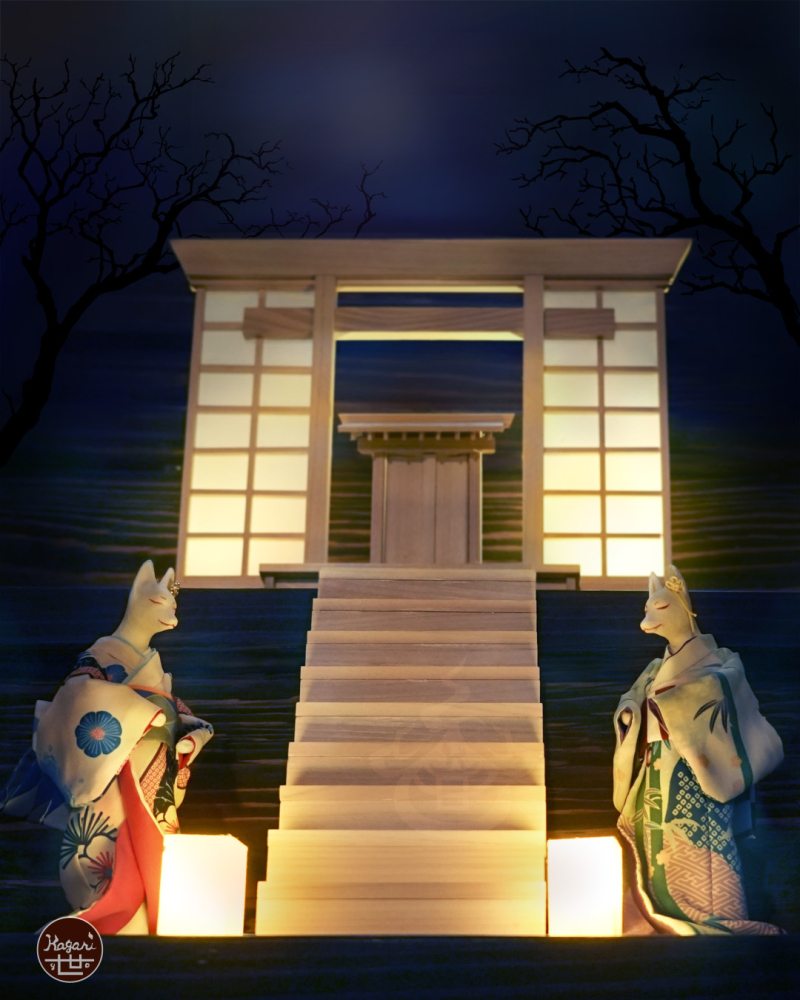 Kimono-wearing fox standing before a wooden gate-style display